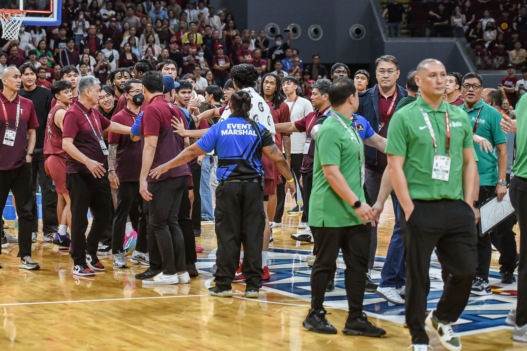 A commotion between the UP Fighting Maroons and the De La Salle Green Archers after their round 1 encounter in the UAAP Season 87 men's basketball tournament, October 6, 2024 at the Mall of Asia Arena. Courtesy: Joaqui Flores